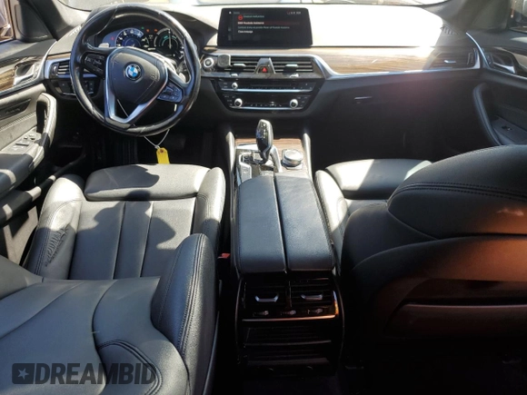 2018 BMW 5 Series 530e with VIN WBAJA9C52JB249402, listed as a Copart auction lot 55093055 with 117,033 mi miles and Salvage title. Bid and sale history available at DreamBid. Image 8.