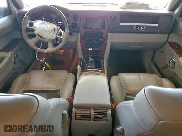 2008 Jeep Commander Limited with VIN 1J8HH58N28C130633, listed as a Copart auction lot 61009065 with 206,121 mi miles and Salvage title. Bid and sale history available at DreamBid. Image 8.