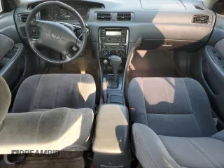 2001 Toyota Camry LE z VIN JT2BF22K010297055, wystawiony jako Copart lot #59510645 z przebiegiem 265 428 mil mil oraz Szkoda całkowita • Salvage title. Historia ofert i sprzedaży dostępna na DreamBid. Obrazek 8.