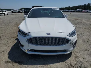 2020 Ford Fusion Titanium с VIN 3FA6P0K99LR174094, выставлен на аукционе Copart как лот 52583435 с пробегом 98 389 миль миль и Списание • Salvage title. История ставок и продаж доступна на DreamBid. Изображение 5.