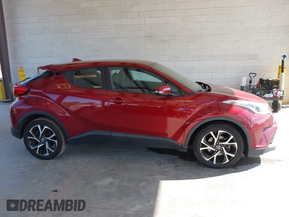 2018 Toyota C-HR XLE with VIN NMTKHMBX6JR027381, listed as a IAAI auction lot 42149905 with 118,897 mi miles and . Bid and sale history available at DreamBid. Image 13.