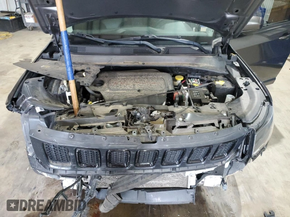 2020 Jeep Compass Latitude z VIN 3C4NJCBB6LT252619, wystawiony jako Copart lot #54860815 z przebiegiem Nie podano mil oraz Szkoda całkowita • Salvage title. Historia ofert i sprzedaży dostępna na DreamBid. Obrazek 12.