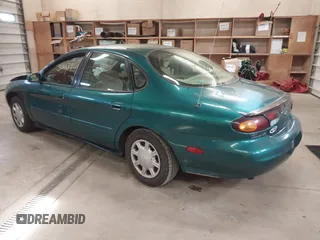 1996 Ford Taurus GL z VIN 1FALP52U5TG110582, wystawiony jako IAAI lot #40858639 z przebiegiem 57 965 mil mil oraz . Historia ofert i sprzedaży dostępna na DreamBid. Obrazek 3.