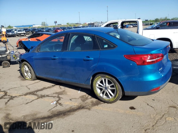 2017 Ford Focus SE with VIN 1FADP3F23HL203794, listed as a Copart auction lot 57202435 with 116,824 mi miles and Salvage title. Bid and sale history available at DreamBid. Image 2.