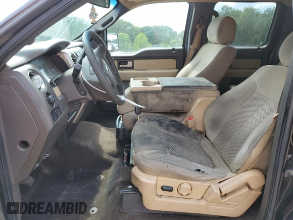 2014 Ford F-150 XL with VIN 1FTFW1EF4EKD49721, listed as a Copart auction lot 61695615 with 217,493 mi miles and Salvage title. Bid and sale history available at DreamBid. Image 7.