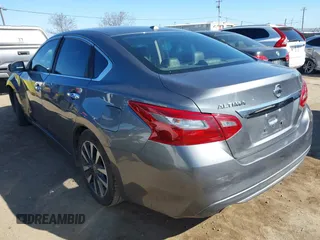2018 Nissan Altima SR with VIN 1N4AL3AP0JC244794, listed as a IAAI auction lot 41677399 with 185,216 mi miles and . Bid and sale history available at DreamBid. Image 3.
