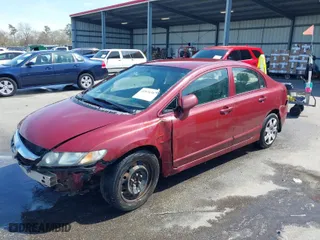 2009 Honda Civic Sdn LX with VIN 2HGFA16569H501792, listed as a IAAI auction lot 41818387 with 282,370 mi miles. Bid and sale history available at carsss.com. Image 2.