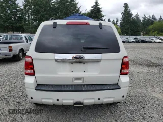 2010 Ford Escape Limited with VIN 1FMCU9EG5AKA70316, listed as a Copart auction lot 62413205 with 106,936 mi miles and Salvage title. Bid and sale history available at DreamBid. Image 6.