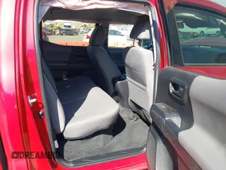 2022 Toyota Tacoma SR with VIN 3TYAX5GNXNT042988, listed as a IAAI auction lot 41879152 with 30,383 mi miles and . Bid and sale history available at DreamBid. Image 8.