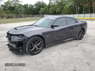 2019 Dodge Charger R/T z VIN 2C3CDXCT9KH740536, wystawiony jako Copart lot #56574985 z przebiegiem 89 257 mil mil oraz Szkoda całkowita • Salvage title. Historia ofert i sprzedaży dostępna na DreamBid. Obrazek 1.