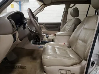 2002 Toyota Land Cruiser z VIN JTEHT05J922018964, wystawiony jako Copart lot #60111015 z przebiegiem 245 890 mil mil oraz Czysty tytuł • Clean title. Historia ofert i sprzedaży dostępna na DreamBid. Obrazek 7.