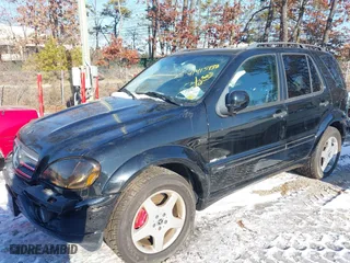 2001 Mercedes-Benz M-Class AMG with VIN 4JGAB74E71A255572, listed as a IAAI auction lot 41415938 with 78,185 mi miles. Bid and sale history available at carsss.com. Image 2.