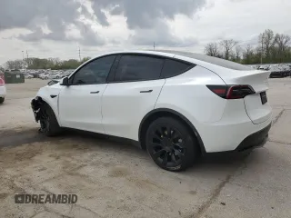 2023 Tesla Model Y Long Range z VIN 7SAYGAEE9PF686434, wystawiony jako Copart lot #54593475 z przebiegiem Nie podano mil oraz Szkoda całkowita • Salvage title. Historia ofert i sprzedaży dostępna na DreamBid. Obrazek 2.
