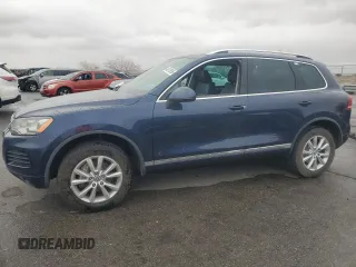 2014 Volkswagen Touareg Sport with VIN WVGEF9BP8ED009107, listed as a Copart auction lot 49070895 with 119,652 mi miles and Clean Title. Bid and sale history available at DreamBid. Image 1.