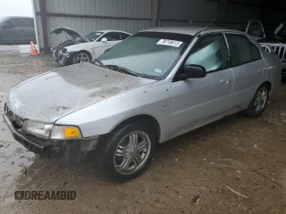 1999 Mitsubishi Mirage DE z VIN JA3AY26A9XU020175, wystawiony jako Copart lot #78718613 z przebiegiem 265 514 mil mil oraz Czysty tytuł • Clean title. Historia ofert i sprzedaży dostępna na DreamBid. Obrazek 1.