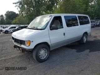 2002 Ford Econoline Passenger XL with VIN 1FMRE11WX2HA57114, listed as a Copart auction lot 68766174 with 167,382 mi miles and Salvage Title. Bid and sale history available at DreamBid. Image 1.
