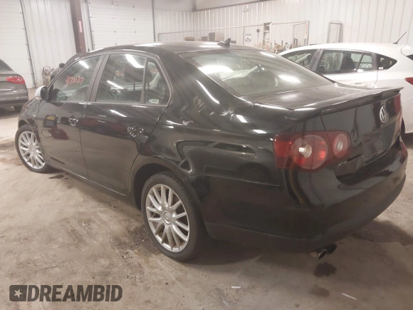 2008 Volkswagen Jetta z VIN 3VWRA71K58M183060, wystawiony jako IAAI lot #41700707 z przebiegiem 174 555 mil mil oraz . Historia ofert i sprzedaży dostępna na DreamBid. Obrazek 3.