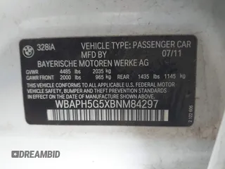 2011 BMW 3 Series 328i with VIN WBAPH5G5XBNM84297, listed as a IAAI auction lot 41535762 with 159,999 mi miles. Bid and sale history available at carsss.com. Image 9.