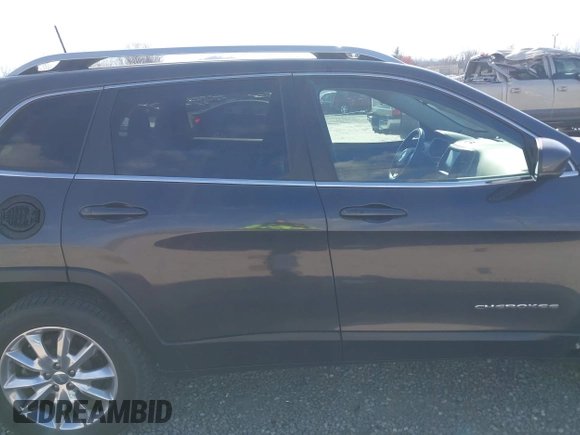 2016 Jeep Cherokee Limited with VIN 1C4PJMDB9GW321735, listed as a IAAI auction lot 41886999 with 62,604 mi miles. Bid and sale history available at carsss.com. Image 14.