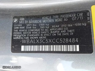 2012 BMW 6 Series 650i with VIN WBALX3C5XCC528484, listed as a IAAI auction lot 42080063 with 120,995 mi miles. Bid and sale history available at carsss.com. Image 9.