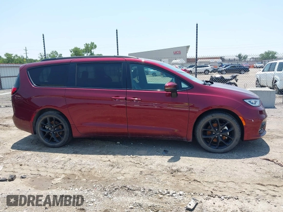 2023 Chrysler Pacifica Touring L with VIN 2C4RC1BG7PR513017, listed as a IAAI auction lot 42441272 with 23,310 mi miles and . Bid and sale history available at DreamBid. Image 13.