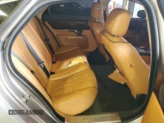 2013 Jaguar XJ with VIN SAJWJ1CD1D8V51462, listed as a Copart auction lot 50527985 with 62,995 mi miles and Salvage title. Bid and sale history available at DreamBid. Image 10.