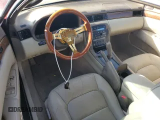 1997 Lexus SC 300 z VIN JT8CD32Z1V0040141, wystawiony jako Copart lot #85372924 z przebiegiem Nie podano mil oraz Szkody całkowita. Historia ofert i sprzedaży dostępna na DreamBid. Obrazek 8.