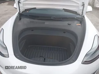 2021 Tesla Model 3 Standard Range Plus z VIN 5YJ3E1EA3MF043860, wystawiony jako IAAI lot #41214748 z przebiegiem 32 753 mil mil oraz . Historia ofert i sprzedaży dostępna na DreamBid. Obrazek 10.