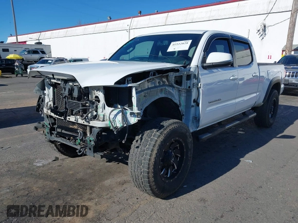 2017 Toyota Tacoma SR5 with VIN 3TMDZ5BN3HM023813, listed as a IAAI auction lot 41522828 with 128,533 mi miles and . Bid and sale history available at DreamBid. Image 20.