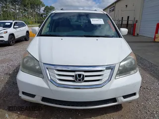 2010 Honda Odyssey EX-L with VIN 5FNRL3H67AB003148, listed as a IAAI auction lot 42244575 with 176,119 mi miles and . Bid and sale history available at DreamBid. Image 6.