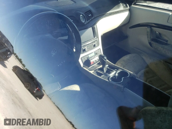 2013 Maserati GranTurismo Sport with VIN ZAM45VLA8D0067421, listed as a Copart auction lot 69464472 with Not provided miles and Salvage title. Bid and sale history available at DreamBid. Image 8.