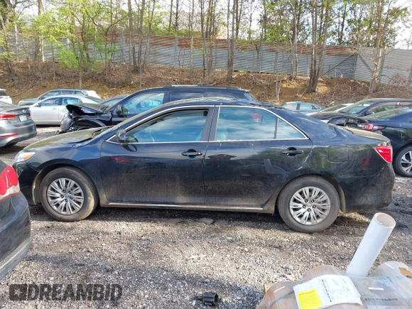 2014 Toyota Camry L with VIN 4T4BF1FK7ER395057, listed as a IAAI auction lot 42215441 with 166,247 mi miles and . Bid and sale history available at DreamBid. Image 15.