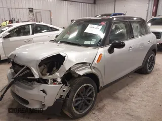 2015 MINI Countryman z VIN WMWZB3C59FWR46546, wystawiony jako IAAI lot #41687489 z przebiegiem 95 734 mil mil oraz . Historia ofert i sprzedaży dostępna na DreamBid. Obrazek 2.