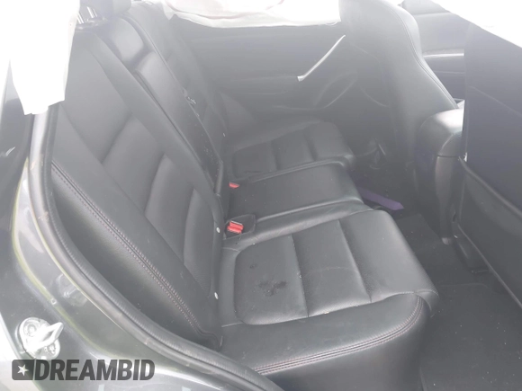 2016 Mazda CX-5 Grand Touring with VIN JM3KE4DY1G0743897, listed as a IAAI auction lot 41935796 with 167,150 mi miles and . Bid and sale history available at carsss.com. Image 8.