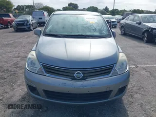 2011 Nissan Versa 1.8 SL with VIN 3N1BC1CP3BL402120, listed as a IAAI auction lot 42006620 with 147,023 mi miles. Bid and sale history available at carsss.com. Image 12.
