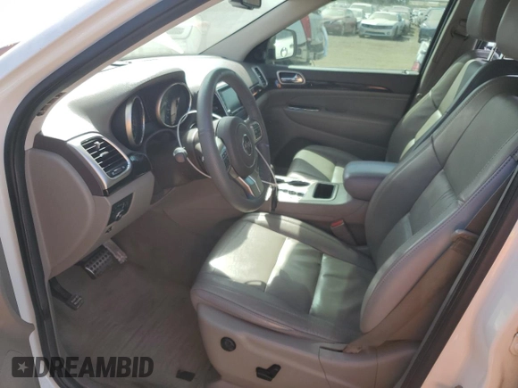 2012 Jeep Grand Cherokee Laredo with VIN 1C4RJEAG0CC222943, listed as a Copart auction lot 52899545 with 153,389 mi miles and Salvage Title. Bid and sale history available at carsss.com. Image 7.