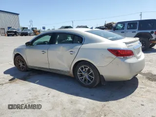 2013 Buick LaCrosse Touring with VIN 1G4GJ5G32DF290507, listed as a Copart auction lot 52973005 with 199,501 mi miles and Salvage title. Bid and sale history available at DreamBid. Image 2.