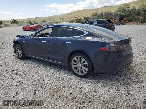 2014 Tesla Model S 60 with VIN 5YJSA1S12EFP29885, listed as a Copart auction lot 59769215 with Not provided miles and Salvage title. Bid and sale history available at DreamBid. Image 2.
