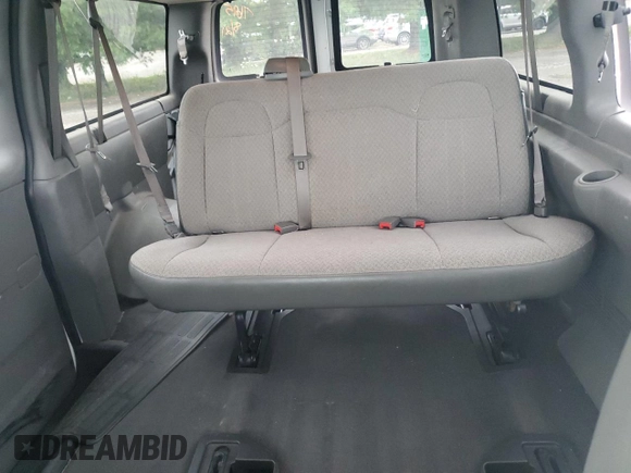 2014 Chevrolet Express Passenger 1LT with VIN 1GAZGYFG9E1207695, listed as a Copart auction lot 62146754 with 108,836 mi miles and Salvage title. Bid and sale history available at DreamBid. Image 10.