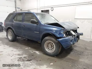2003 Isuzu Rodeo with VIN 4S2CK58W634308515, listed as a IAAI auction lot 41843174 with 158,748 mi miles. Bid and sale history available at carsss.com. Image 1.