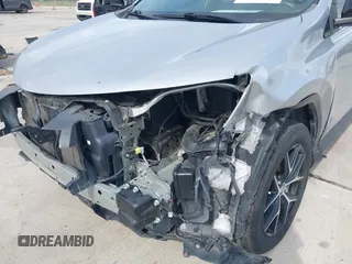 2018 Toyota RAV4 SE with VIN 2T3NFREV9JW424156, listed as a IAAI auction lot 42110768 with 80,376 mi miles and . Bid and sale history available at DreamBid. Image 6.