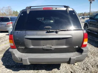 2004 Jeep Grand Cherokee Laredo z VIN 1J4GX48N14C435481, wystawiony jako Copart lot #87855975 z przebiegiem 176 273 mil mil oraz Szkoda całkowita • Salvage title. Historia ofert i sprzedaży dostępna na DreamBid. Obrazek 6.