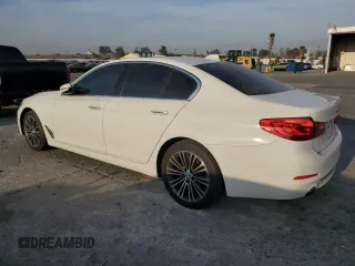 2018 BMW 5 Series 530i with VIN WBAJA5C54JWA38044, listed as a Copart auction lot 86167974 with 82,200 mi miles and Salvage Title. Bid and sale history available at carsss.com. Image 2.