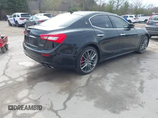 2016 Maserati Ghibli S z VIN ZAM57RSA0G1175621, wystawiony jako IAAI lot #42055212 z przebiegiem 52 731 mil mil oraz . Historia ofert i sprzedaży dostępna na DreamBid. Obrazek 4.