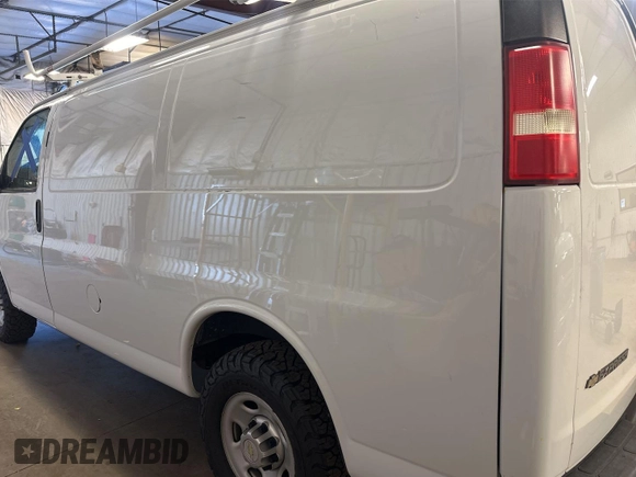 2014 Chevrolet Express Cargo with VIN 1GCWGFCG7E1132515, listed as a IAAI auction lot 42729868 with 179,071 mi miles and . Bid and sale history available at DreamBid. Image 8.
