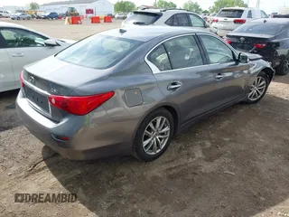 2015 Infiniti Q50 Premium z VIN JN1BV7AR1FM398047, wystawiony jako IAAI lot #42203862 z przebiegiem 104 002 mil mil oraz . Historia ofert i sprzedaży dostępna na DreamBid. Obrazek 4.