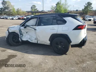 2021 Toyota RAV4 Hybrid XSE with VIN 2T3E6RFV1MW028094, listed as a Copart auction lot 52596615 with 68,497 mi miles and Salvage title. Bid and sale history available at DreamBid. Image 2.