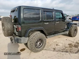 2012 Jeep Wrangler Unlimited Altitude with VIN 1C4HJWEGXCL180602, listed as a Copart auction lot 61391095 with 187,205 mi miles and Salvage title. Bid and sale history available at DreamBid. Image 3.