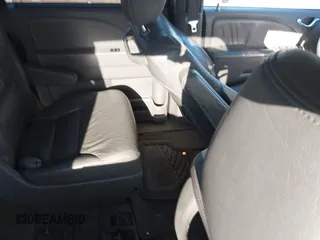 2010 Honda Odyssey EX-L with VIN 5FNRL3H77AB096732, listed as a IAAI auction lot 41831744 with 22,523 mi miles and . Bid and sale history available at DreamBid. Image 8.