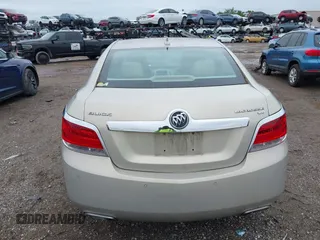 2011 Buick LaCrosse CXS with VIN 1G4GE5ED4BF301990, listed as a IAAI auction lot 41987714 with 144,554 mi miles and . Bid and sale history available at DreamBid. Image 16.